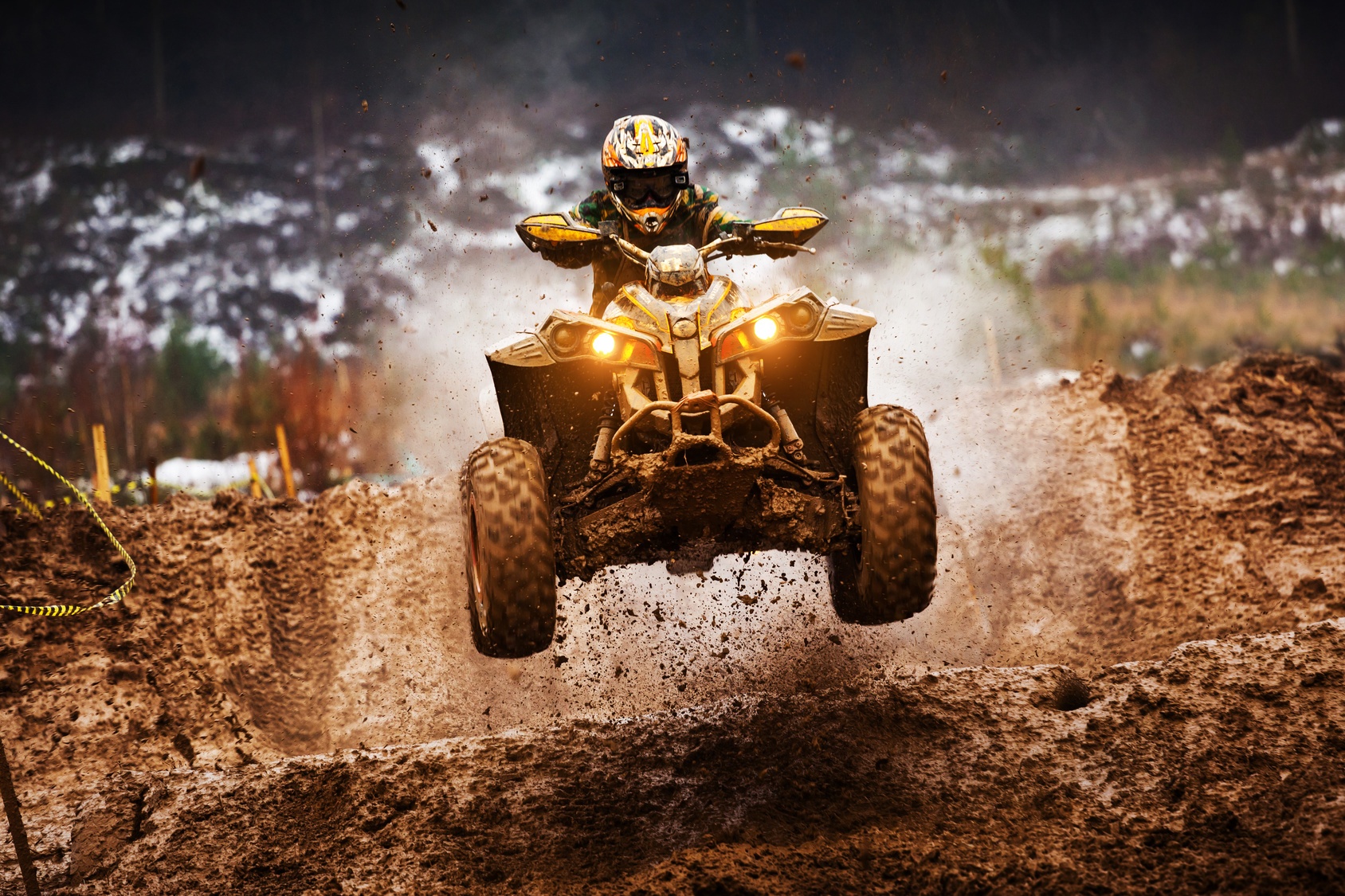 ATV_Jumping_Dirt_Pile_Mud_Spray ATV jumping dirt ramp kicking mud everywhere