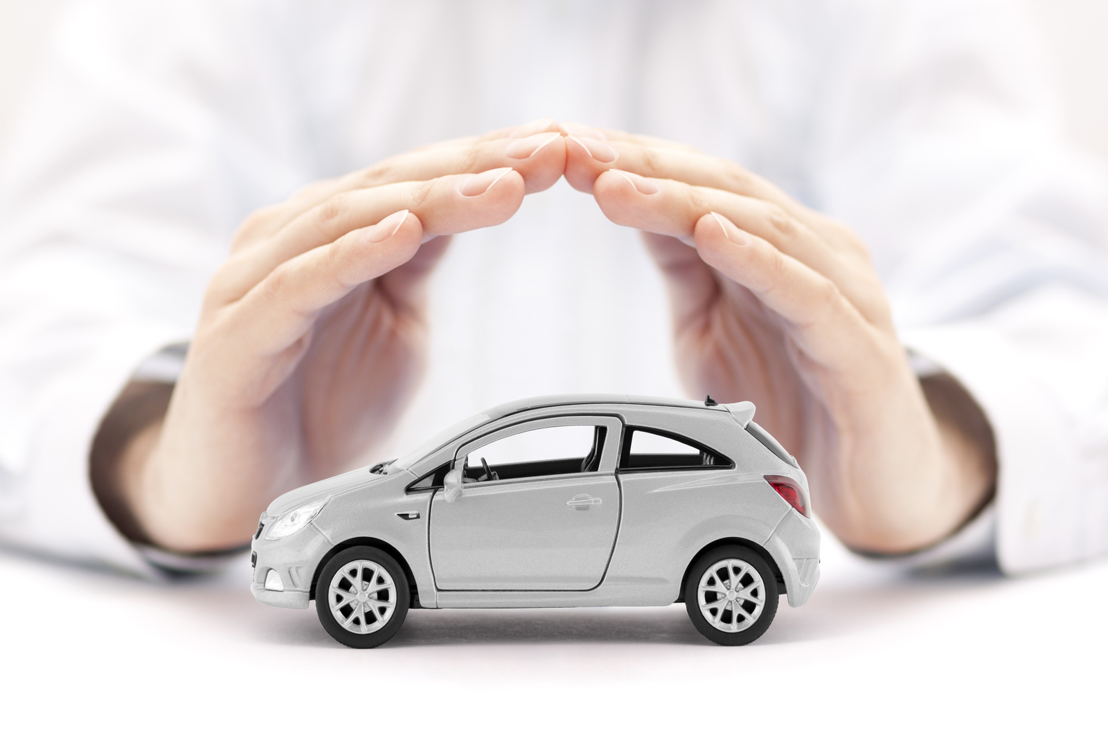Someone protecting a toy car