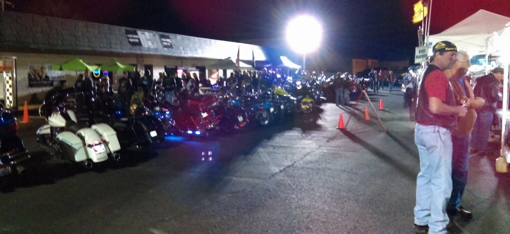 Bike_Night_2-167357-edited a line of motorcycles parked at night