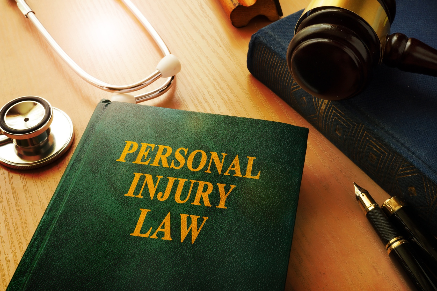 Personal_Injury_Lawsuit A green book titled "personal injury law"