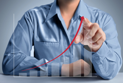 pushing a graph Business man pushing a graph