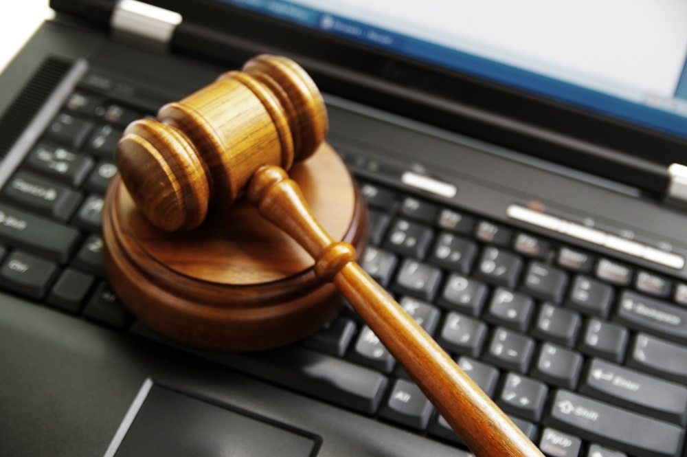 low%20social-919917-edited A gavel on a laptop