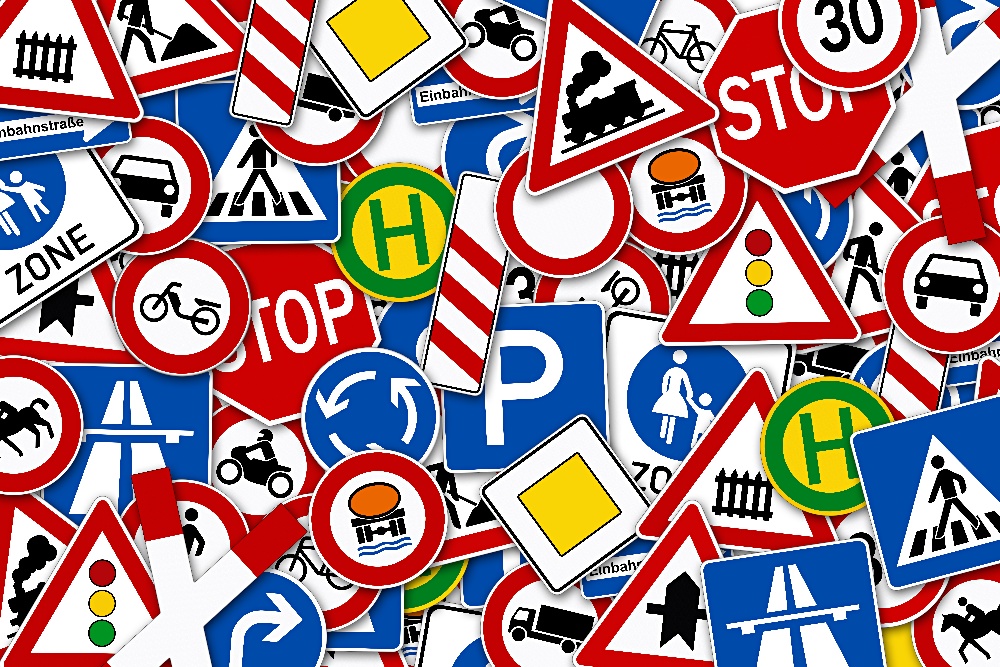 low%20traffic-1 A pile of various traffic signs