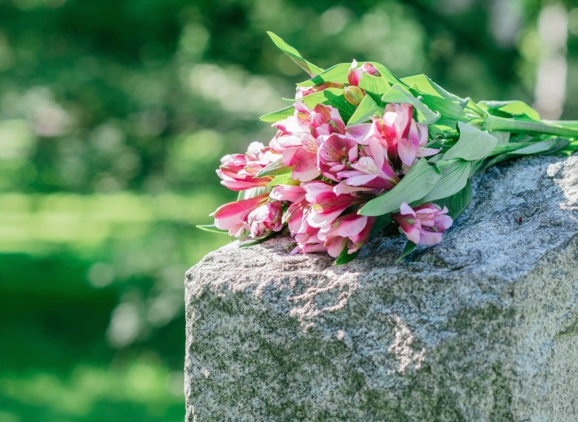 flowers on a tombstone