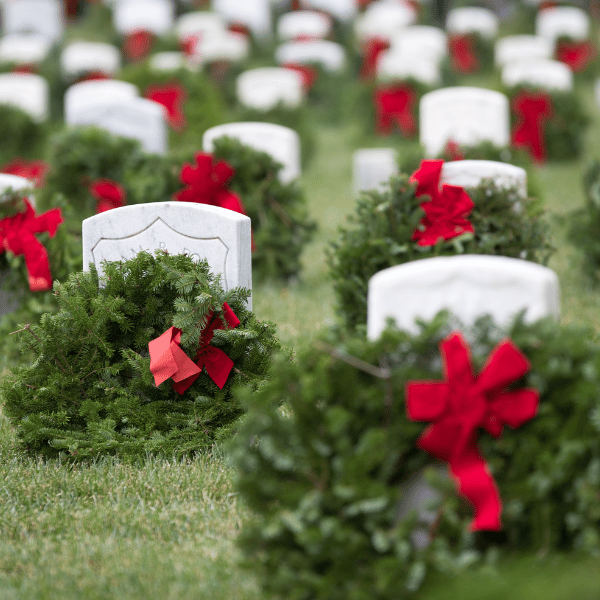 Wreaths on tombstones for wreaths across america